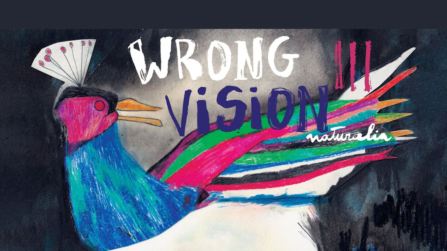 Nell'immagine è presente un pavone colorato e la scritta Wrong Vision III
