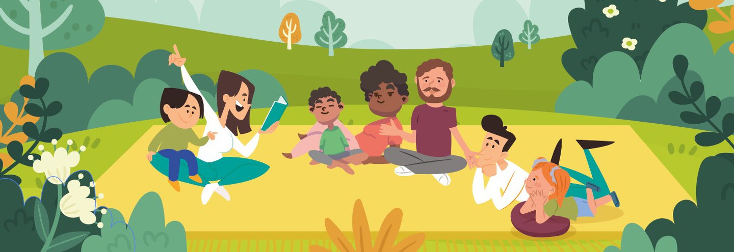 famiglie che leggono in un parco